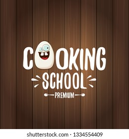 Cooking school classes logo or label with white egg cartoon character isolated on wooden background. Vector Creative concept of cooking lessons for kids