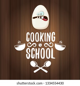 Cooking school classes logo or label with white egg cartoon character isolated on wooden background. Vector Creative concept of cooking lessons for kids