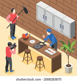 Cooking show isometric colored background man cooks eggs and explains recipe on camera for TV show vector illustration