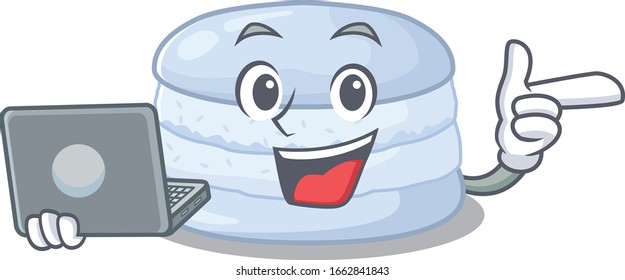 Cool character of blueberry macaron working with laptop