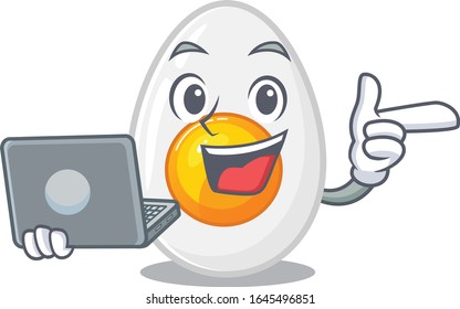 Cool character of boiled egg working with laptop