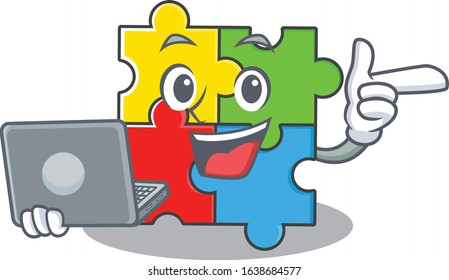 Cool character of puzzle toy working with laptop