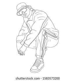 cool guy in tracksuit sits on the floor and wears a tracksuit. sunglasses, hat, hiphop, russian squat, monochrome.
