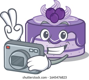 Cool Photographer blueberry cake character with a camera