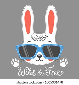 Cool rabbit boy face with sunglasses, footprint. Wild and Free slogan. Vector illustration for children print design, kids t-shirt, baby wear