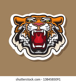 Cool roaring Tiger sticker. Tigers sport team emblem template. T-shirt graphic, logo, sticker, badge. Vector illustration with a cartoon flat style angry head of a tiger.