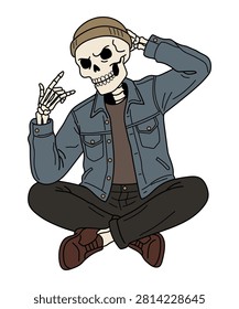 Cool skeleton sitting cross legged in denim jacket and beanie making rock hand gesture.