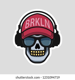 Cool skull in a cap and headphones