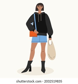 Cool stylish young Girl with shopping bag. Isolated on blue background. Hand drawn colored trendy vector illustration. Fashion. Modern busy woman and eco shopping concept.