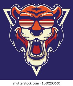 Cool Tiger Mascot. Strong Wildlife Animal Head Isolated On Blue Background. Angry Mammal In Hipster Glasses Sticker, Logo, Patch, Emblem. Wild Cat Color Old School Tattoo, Apparel Print Design