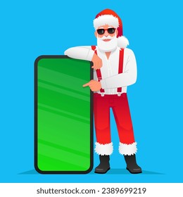 Cool trendy Santa Claus in sunglasses points to a big phone. Santa in a white shirt with suspenders rests his hand on a huge smartphone with a chroma key. New Year's concept for advertising svg