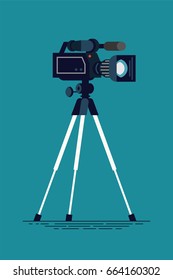 Cool vector flat design video camera on tripod, isolated