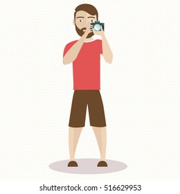 Cool vector photographer character web icon with camera standing full length taking photos.
