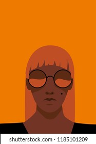 Cool woman with bronze tan, long blonde hair wearing round glasses.