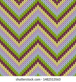 Cool zigzag chevron stripes knit texture geometric seamless pattern. Carpet knit effect ornament. Scandinavian style seamless knitted pattern. Winter holidays wallpaper.