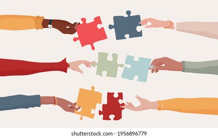 Cooperation and collaboration concept. Hands holding a jigsaw puzzle piece which joins another puzzle piece. Communication between diverse people. Arms of multiethnic people. Team. Banner