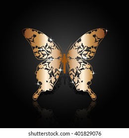 Copper abstract butterfly with floral pattern on black background.