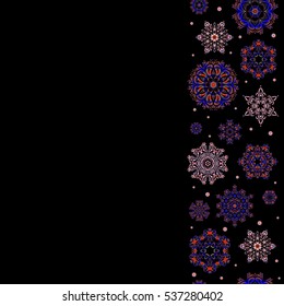 Copy space (place for your text). Seamless design on black background in red and pink colors. Vertical vector winter pattern. Abstract seamless with Floral Elements.