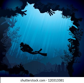 Coral Reef With Silhouette Of Diver On Blue Sea Background