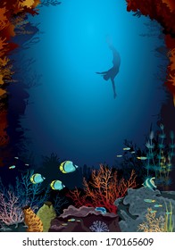 Coral reef with underwater creatures and freediver in a blue sea.