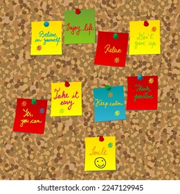 Cork board with positive messages on colorful sticky notes
