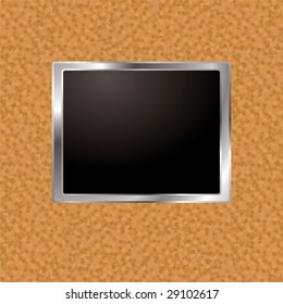 Pared de tablero de corcho con marco de bisel plateado y soporte de imagen en blanco