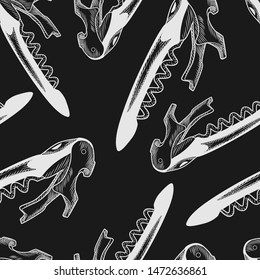 Corkscrew seamless pattern on blackboard. Sommelier knife backdrop. Concept Wrapping paper. Vector illustration