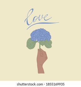 Cornflower flower with the inscription Love. The hand holding the flowers. Concept for a gift for Mother's day, Daughter's day, March 8, people give bouquets. Beautiful isolated blue flower. Vector
