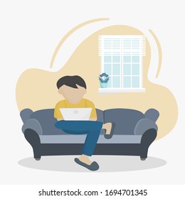 Coronavirus COVID-19 concept, Stay at home. Work from home during an outbreak of the COVID-19 virus. Young man is sitting with laptop on the sofa at home.