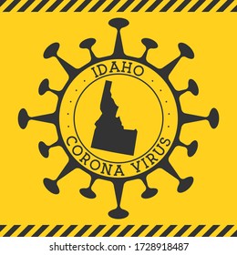 Coronavirus in Idaho sign. Round badge with the shape of the virus and Idaho map. Yellow US state epidemic lockdown stamp. Vector illustration.