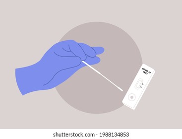 A coronavirus PCR express test kit, a hand holding a cotton swab next to a plastic cassette with strip indicators