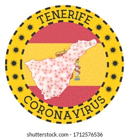 Coronavirus in Tenerife sign. Round badge with shape of Tenerife. Yellow island lockdown emblem with title and virus signs. Vector illustration.