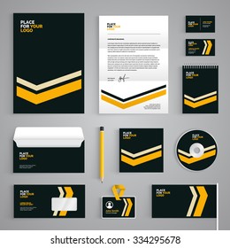 Corporate identity branding template. Abstract vector stationery design with yellow stripes illustration on dark background. Business documentation