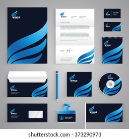 Corporate identity branding template. Abstract vector stationery design with wings illustration symbol on dark blue background. Business documentation