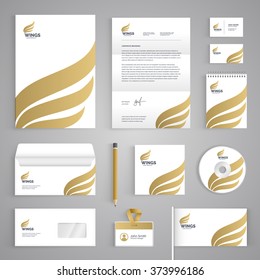 Corporate identity branding template. Abstract vector stationery design with golden wings illustration symbol on white background. Business documentation