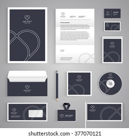 Corporate identity branding template. Abstract vector stationery design with heart illustration symbol on dark background. Business documentation