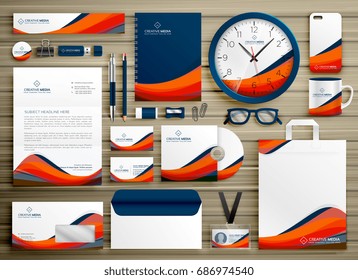 corporate identity business template design set with orange blue wavy shape