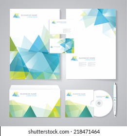 Corporate identity template with blue and green geometric elements. Documentation for business.