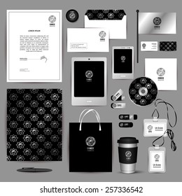 Corporate identity template. Folder, pen, magnet, envelope, flag, phone / tablet interface design, business card, disc with packaging, flash memory cards, paper-bag, coffee cup holder, badges. Vector.