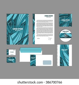 Corporate identity template with hand drawn blue exotic tropical leaf pattern, creative stationery branding mock-up set of separated, movable objects in vector. EPS 10.
