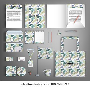 Corporate identity template with a pattern of trendy geometric shapes, textured brush strokes, abstract decor elements.