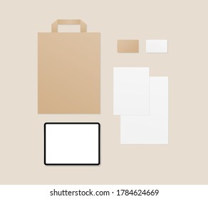 Conjunto de plantillas de identidad corporativa. Tableta, Papeles, tarjetas de visita, bolsa de papel. Modelación sobre el papel de negocios. Vector de mordaza aislado. Diseño de plantilla. 
