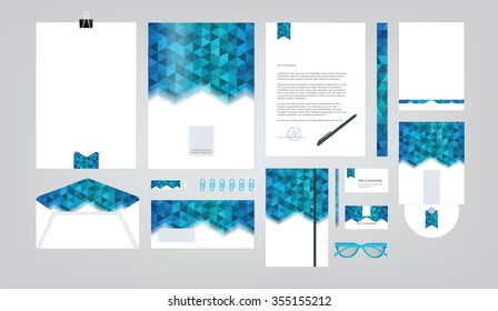 Corporate identity template. Vector company style for brand book and guideline. Folder, pen, envelope, business card, CD disc, flash memory card, pencil, ruler, glasses, and blank sheet.