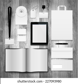 Corporate identity templates on planks. Notebook, tablet, badges, envelope, cd, package, label.