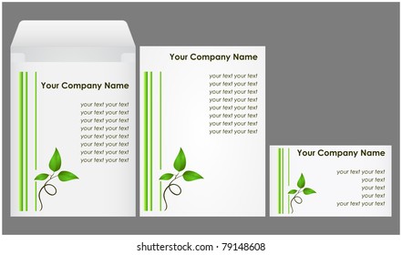 Corporate kit consisting of an envelope, blank paper and a business card with floral elements