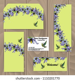 Corporate style template with floral decoration and colibri bird on wooden background.