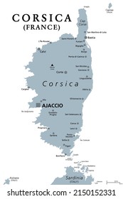 Corsica, gray political map. French island in the Mediterranean Sea, north of Italian island Sardinia, with capital Ajaccio. One of the 18 regions of France and a territorial collectivity of France.