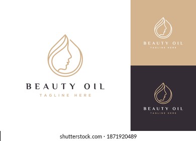 cosmetic design logo or oil drops with woman's face