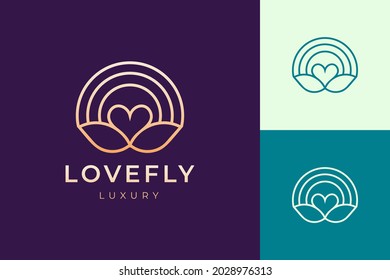 Cosmetic or spa logo in luxury love and leaf shape