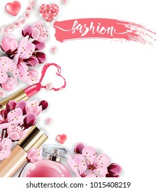Cosmetics and fashion background with make up artist objects: perfume,pink pearl beads, sparkling hearts. Foundation, pink lipstick. with cherry flowers. Spring. fashion and Valentines day Concept.